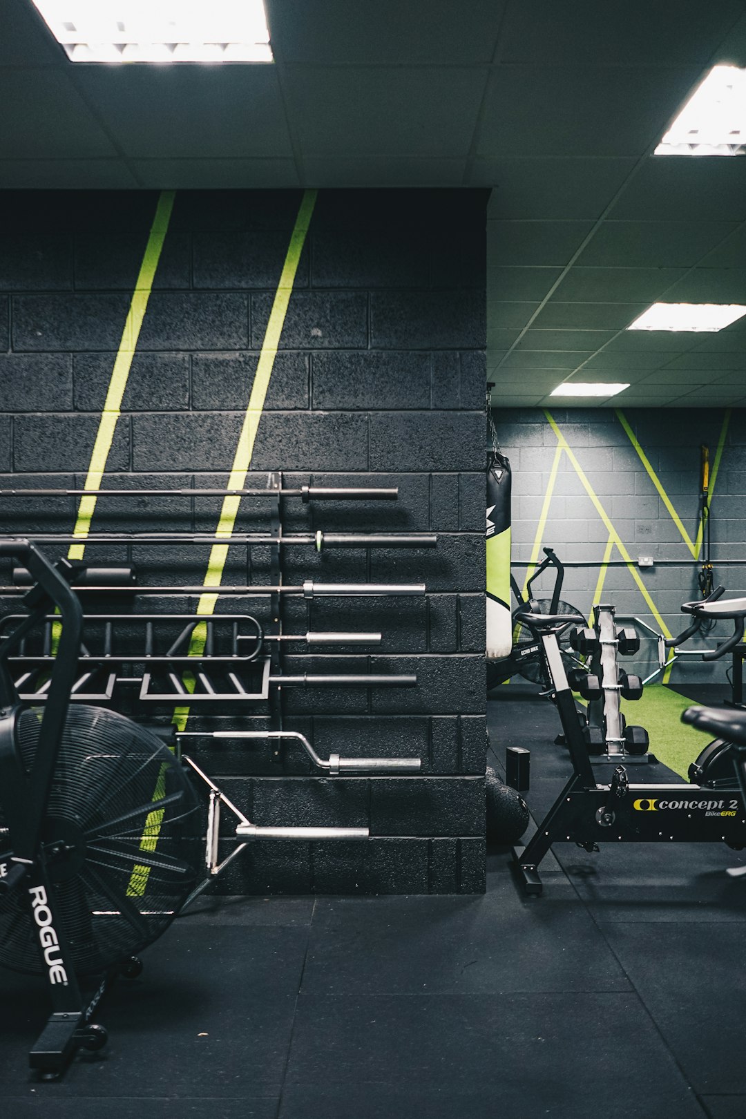 a-gym-with-a-row-of-exercise-bikes-s9q7wxqljyi